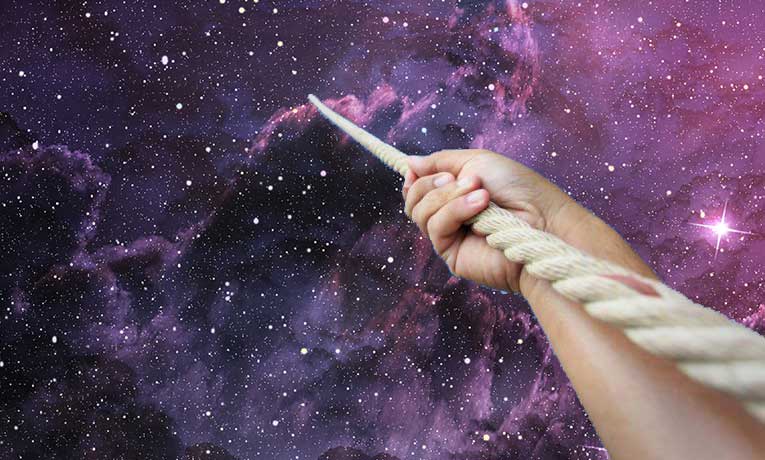 Hand gripping a rope against a starry background - Star Magic Healing