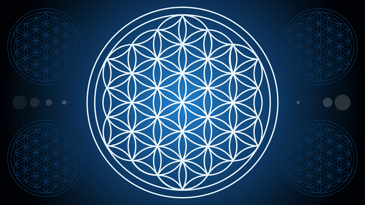 Flower of Life pattern on blue background - Star Magic Healing